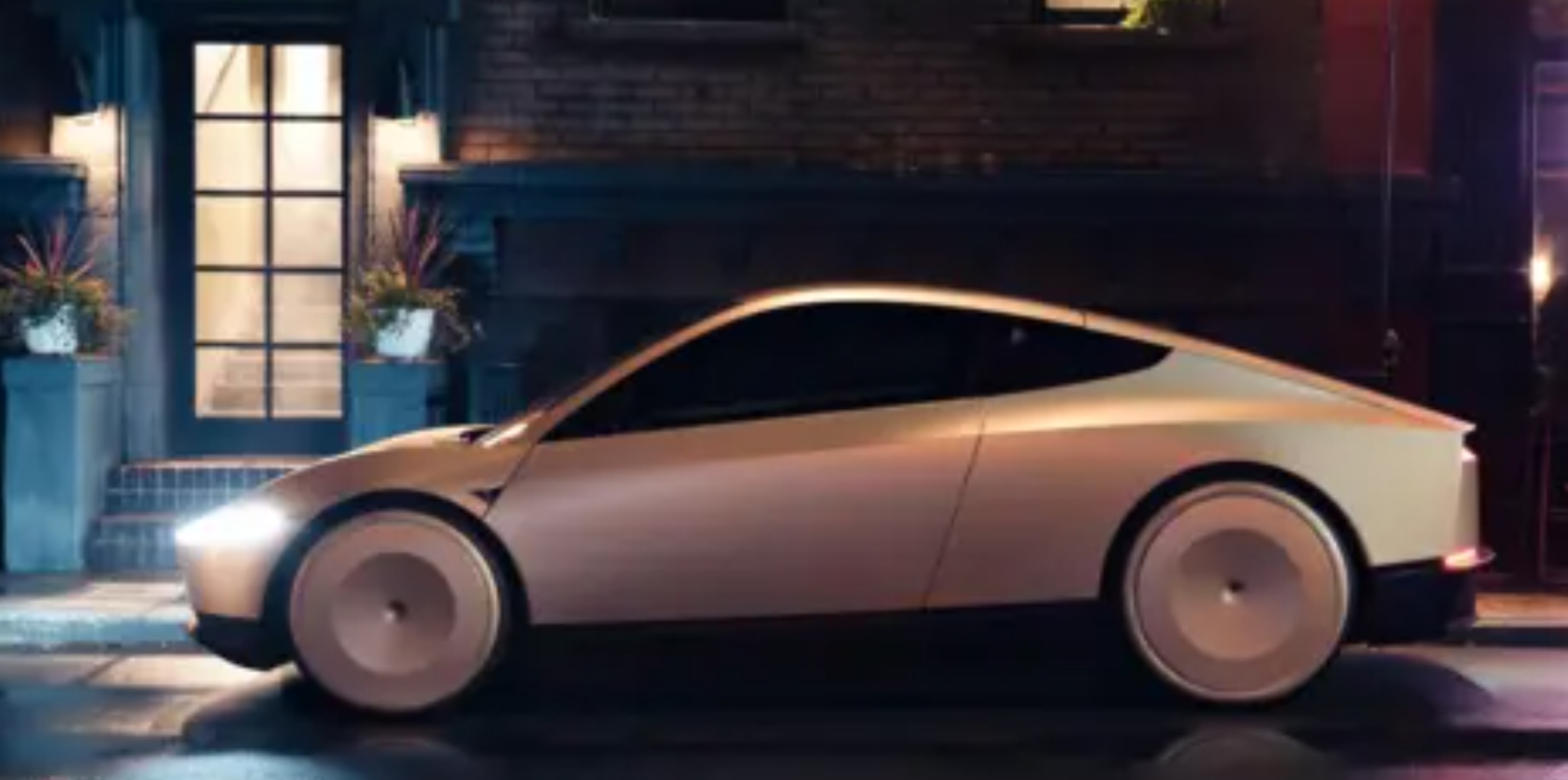 Courtesy of Tesla, Inc Tesla's Cybercab robotaxi parked on a dark, dimly lit street at the Warner Bros Studio in California