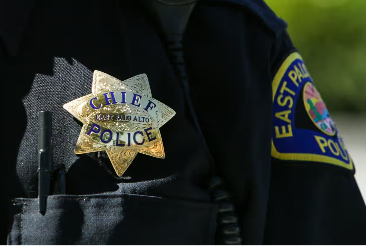 police officer looks at computer screen